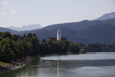 Scenic view of Forggensee lake against sky at Ostallgäu, Germany - JTF01315