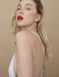 Portrait of blond young woman with red lips - PGCF00012