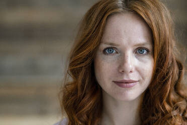 Portrait of redheaded woman with freckles - KNSF06508