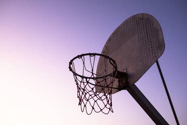 Basketball hoop at sunset - ABZF02591