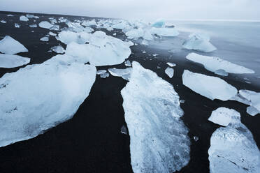 Icebergs on the beach at Jokulsarlon, Iceland, Polar Regions - RHPLF08966