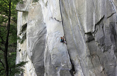 Rock climber in action, Cadarese, Italian Alps, northern Italy, Europe - RHPLF09201