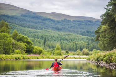 Canoeing the Caledonian Canal, near Fort Augustus, Scottish Highlands, Scotland, United Kingdom, Europe - RHPLF09213