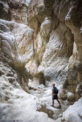 Tourist hiking in Saklikent Gorge, Saklikent National Park, Fethiye Province, Lycia, Anatolia, Turkey, Asia Minor, Eurasia - RHPLF09217