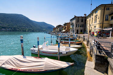 Boats moored at Monte Isola, the largest lake island in Europe, Province of Brescia, Lombardy, Italy, Europe - RHPLF09462