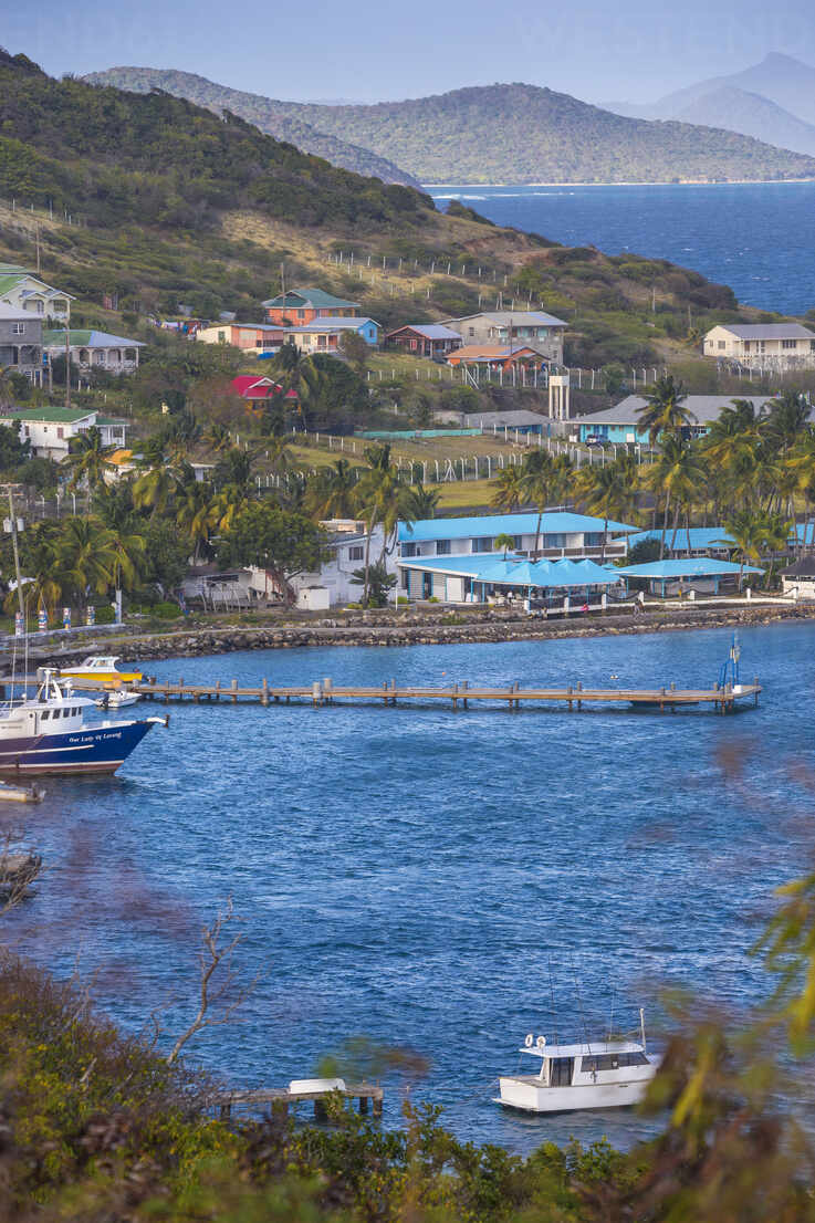 A former commercial fishing boat, now used to sell diesel, in Clifton  Harbour, Union Island, Grenadines, Caribbean Stock Photo - Alamy