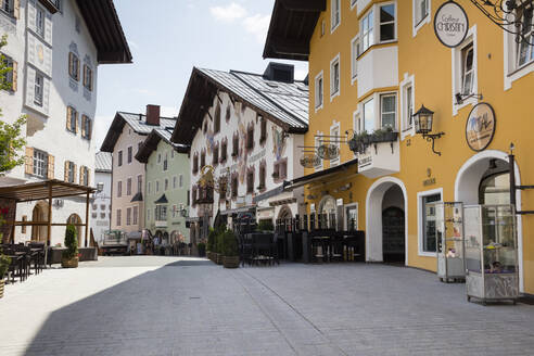 Street amidst buildings at Hinterstadt, Kitzbühel, Tyrol, Austria - WIF04048