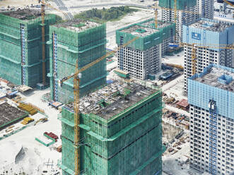 View of construction site during winter seen through airplane window at Malè, Maldives - CVF01518