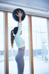 Woman exercising at gym - JOHF00373