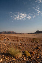 Mountains and gravel plain, Sossusvlei area, at dusk, Namib-Naukluft, Namibia, Africa - RHPLF10527