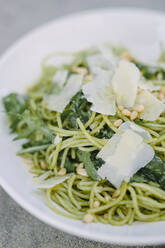 Spaghetti with pesto on plate - JOHF00551