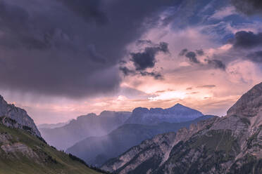 Thunderstorm during sunset on Sella Group, Fassa Valley, Trentino, Dolomites, Italy, Europe - RHPLF10917