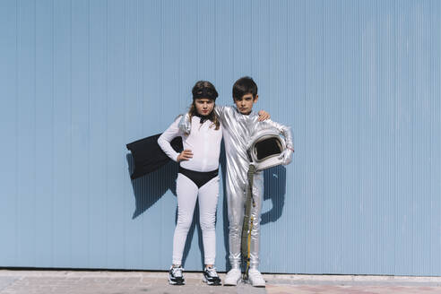Two kids in astronaut and superhero costumes - DAMF00044
