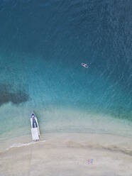 Drone shot of paddleboard on Gili-Air Island, Bali, Indonesia - KNTF03432