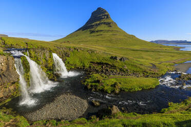 Kirkjufellsfoss waterfall and Kirkjufell mountain in Grundarfjordur, Iceland, Europe - RHPLF11166