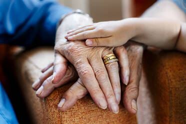 Elderly couple and baby's hand, generations together - GEMF03155