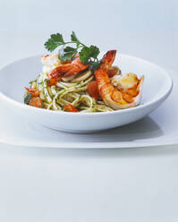 Close-up of spaghetti served in bowl on table - PPXF00283