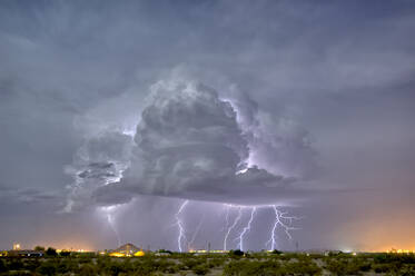 An isolated storm cell illuminated by moonlight during the 2015 Monsoon season, Arizona, United States of America, North America - RHPLF11837