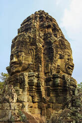 Tower with two of the 216 smiling sandstone faces at 12th century Bayon temple in Angkor Thom walled city, Angkor, UNESCO World Heritage Site, Siem Reap, Cambodia, Indochina, Southeast Asia, Asia - RHPLF11848