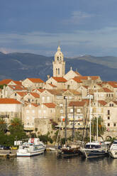 View over harbour to the Old Town, yachts moored beside quay, Korcula Town, Korcula, Dubrovnik-Neretva, Dalmatia, Croatia, Europe - RHPLF11930