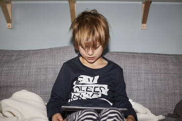 Boy using digital tablet - JOHF00949