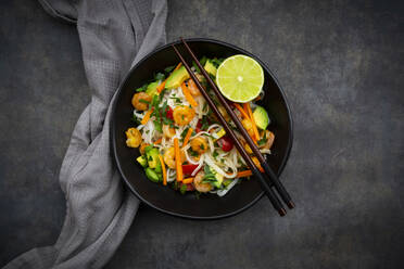 High angle view of cellophane noodles with shrimps and vegetables served in bowl on table - LVF08266