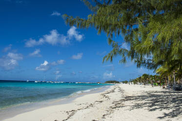 Tranquil view of Norman Saunders beach against blue sky on sunny day, Grand Turk, Turks And Caicos Islands - RUNF03234