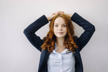 Portrait of redheaded businesswoman - KNSF06626