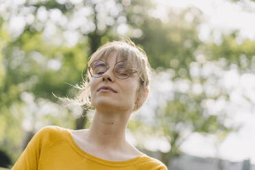 Portrait of young woman with closed eyes - KNSF06691