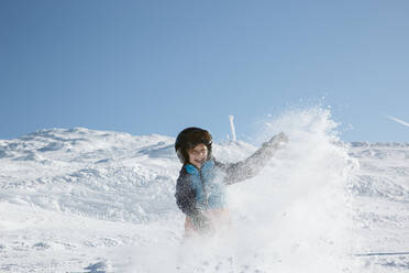 Boy skiing in mountains - JOHF01181