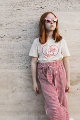 Portrait of teenage girl wearing fashionable clothes - JOHF01234