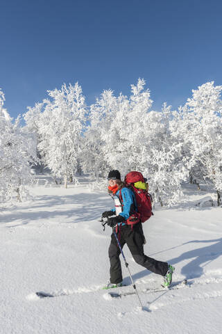 Woman skiing stock photo