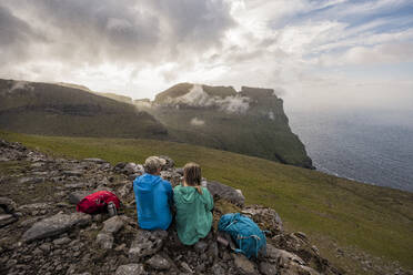 Hikers looking at view - JOHF01671