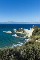 Scenic view of Corfu against blue sky during sunny day, Ionian islands, Greece - RUNF03322