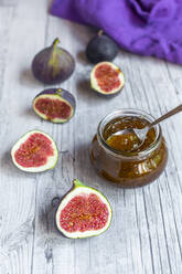 Sliced figs and jar of homemade fig jam - SARF04352