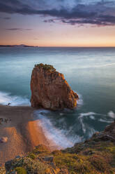 Spain, Girona, Begur, Coastal stack rock at dawn - XCF00248