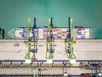 Aerial view of a merchant ship in harbour in Singapore - AAEF03787