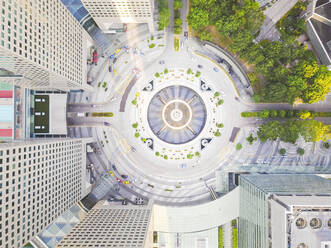 Aerial view of a traffic circle surrounded by buildings in the heart of Singapore - AAEF03788