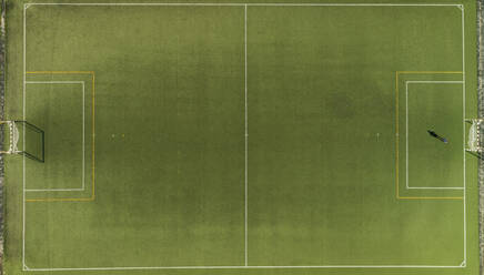 Aerial view of a football training on synthetic surface football pitch on a summer day. - AAEF04234