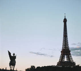 Eiffel tower in the clear blue evening sky - CAVF63798
