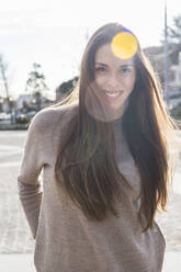 Portrait of happy young woman in Boadilla del Monte, Spain - CAVF64399