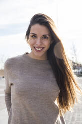 Portrait of happy young woman in Boadilla del Monte, Spain - CAVF64402