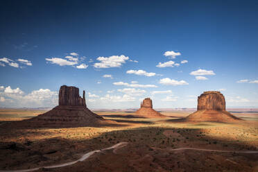 Shadows fall across the iconic stone formations at Monument Valley, AZ - CAVF64551