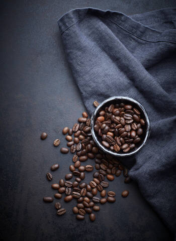 Bowl of cocoa and coffee beans stock photo