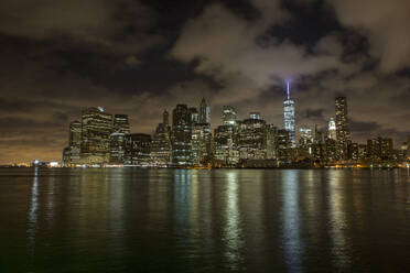 New York cityscape at night as seen from Brooklyn, New York. - CAVF64829