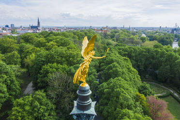 Germany, Bavaria, Munich, Aerial view of gold colored Angel of Peace monument - MMAF01170