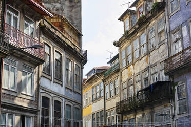 Portugal, Porto, Windows and balconies of old residential buildings - MRF02195