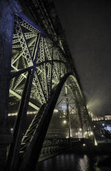Portugal, Porto, Douro, Illuminated Dom Luis I Bridge seen at night  - MRF02211