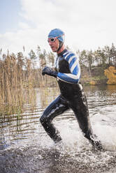 Swimmer running out of water - JOHF02527