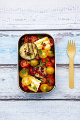 Persian tomato salad with halloumi in metal lunch box - LVF08334